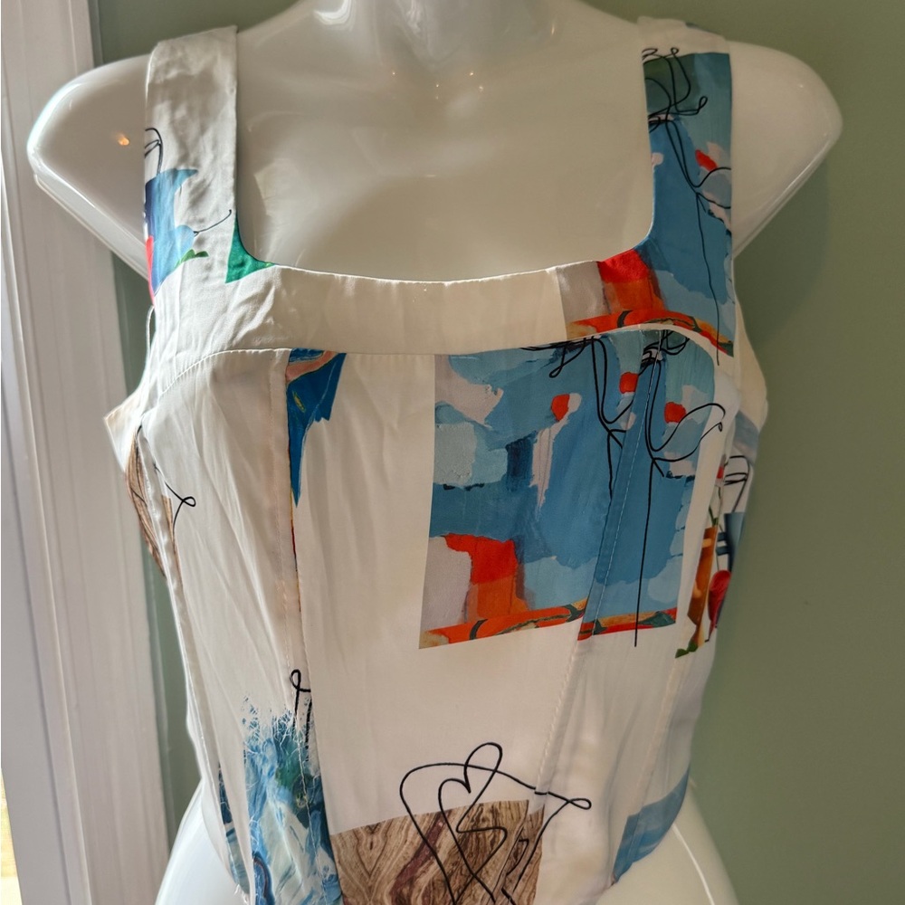 White Sleeveless Top with Abstract Print